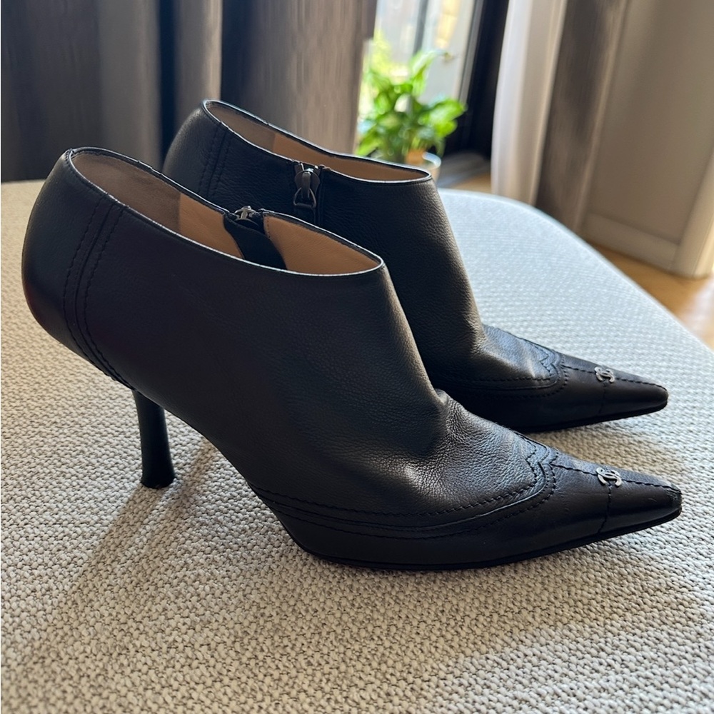 CHANEL Black Heeled Boots with Elegant Pointed Toe